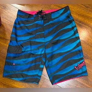 Men’s Island Haze swim trunks, has netting inside, new with tags, size Large.